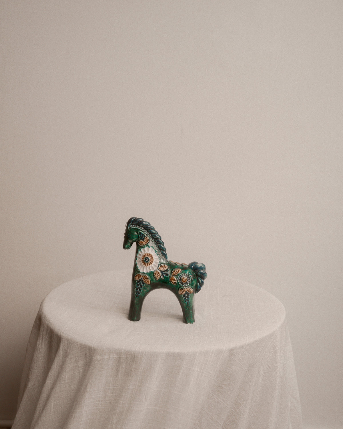 Glazed Ceramic Horse with Floral Relief